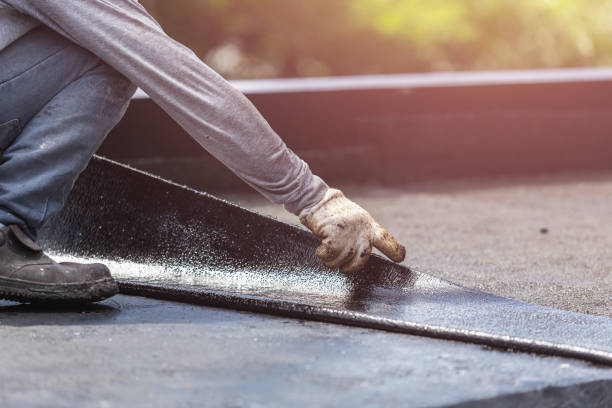 Professional Exterior Waterproofing technician working in Woodbine, GA